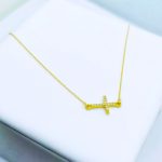 cadena de oro con cruz