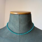 collar turquesa